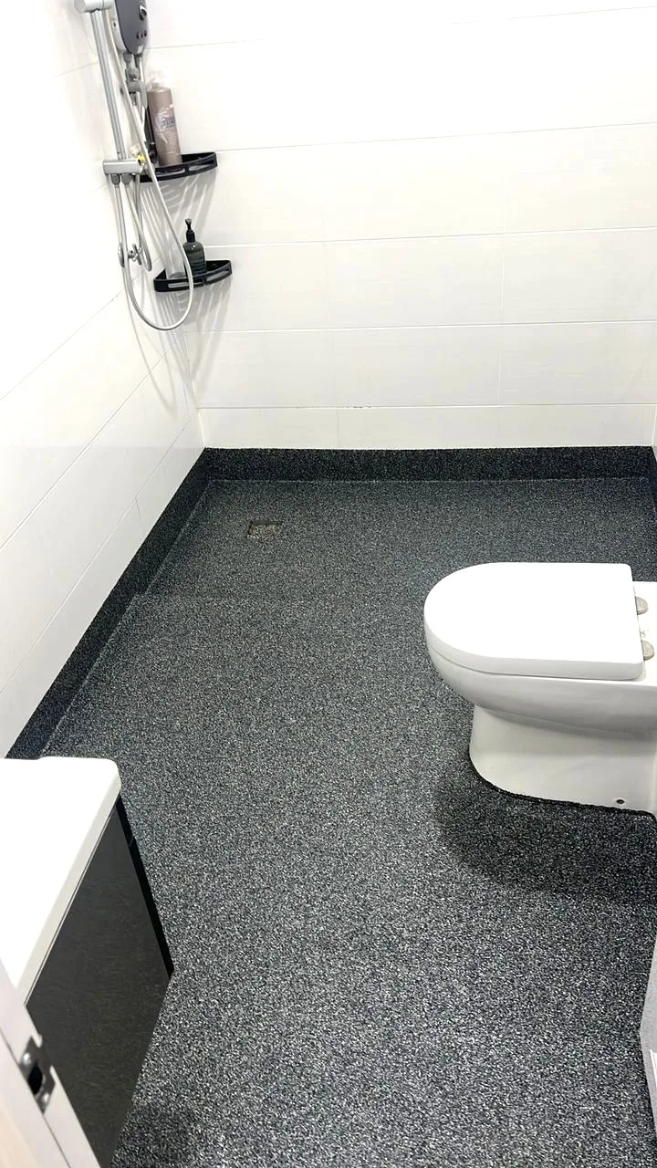 Modern bathroom with durable epoxy floor coating for waterproof and easy-to-clean surface in Selangor
