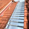Aluminium heat insulation sheet installed under roof tiles by Cisco Waterproofing in Kuala Lumpur for better energy efficiency.